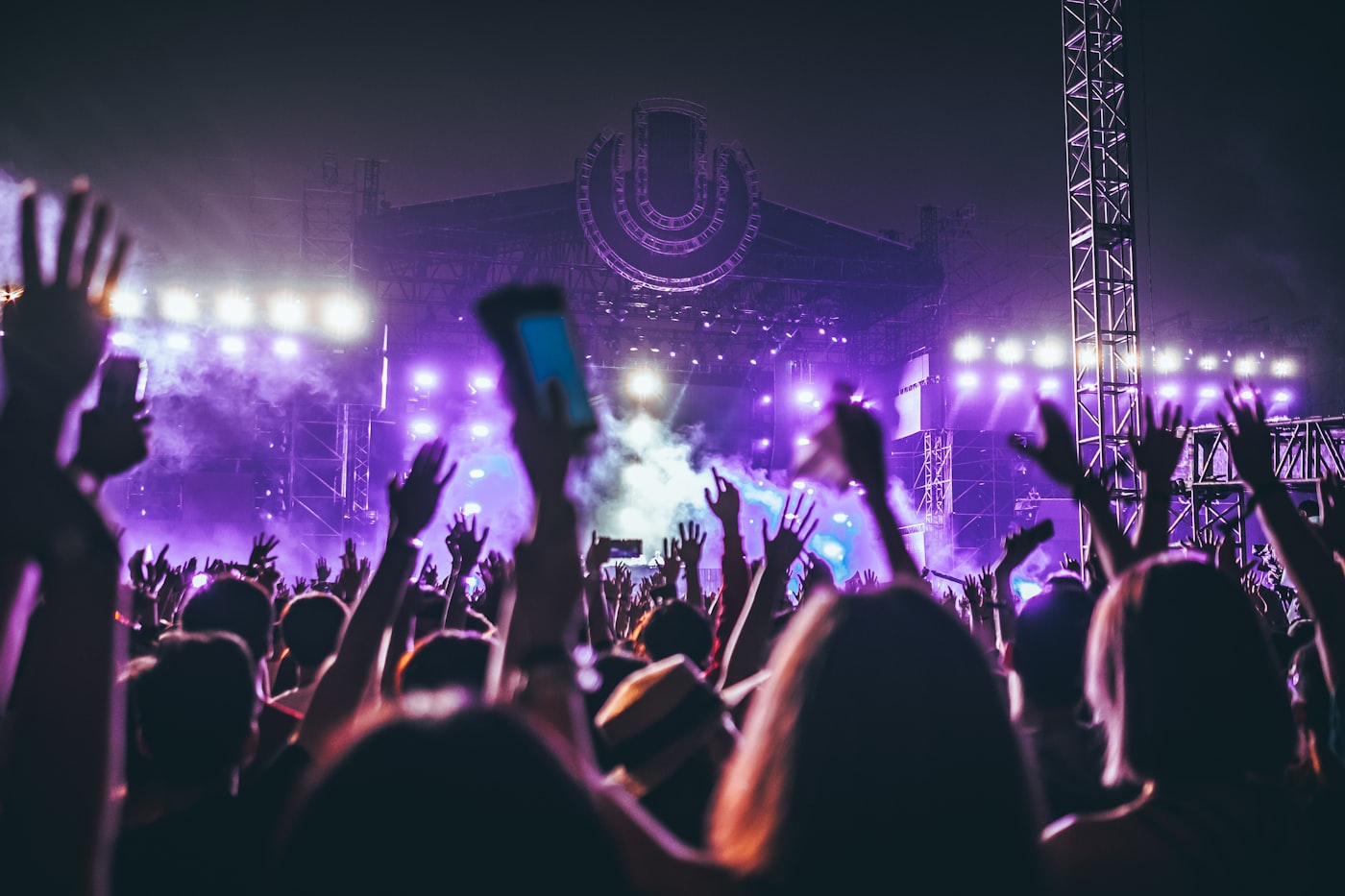 Musician performing under dramatic stage lighting