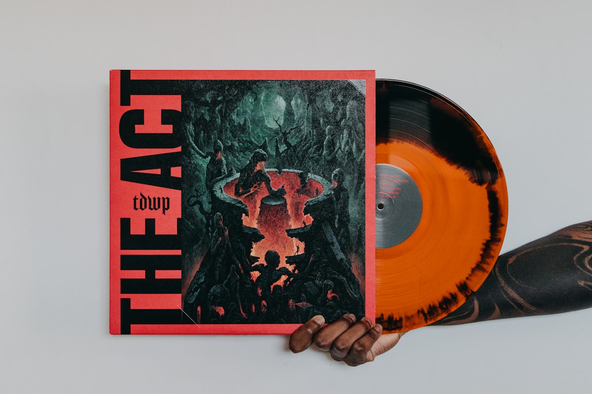 Vinyl records and album artwork in editorial lighting
