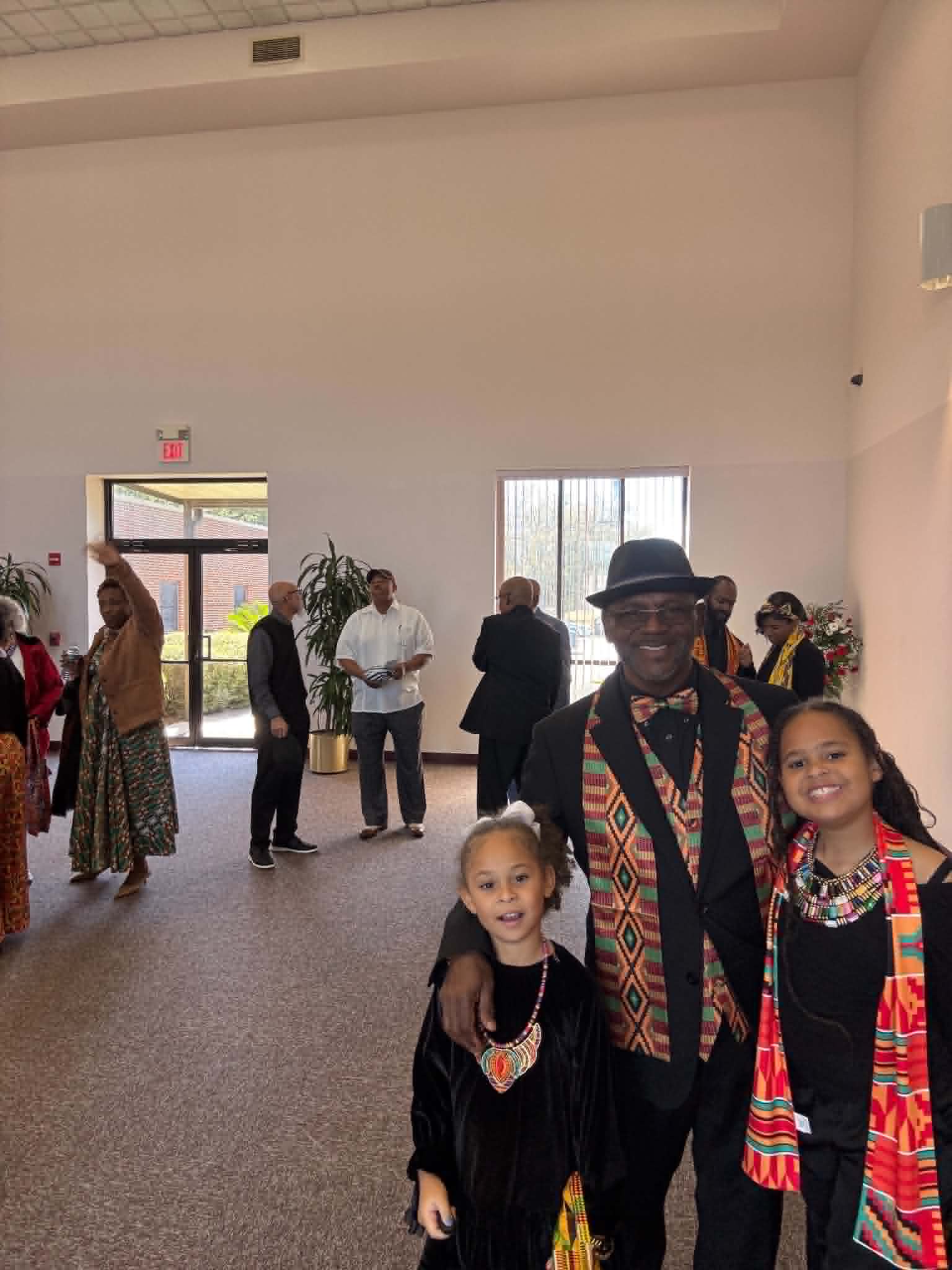 Raphael Ashanti with his granddaughters
